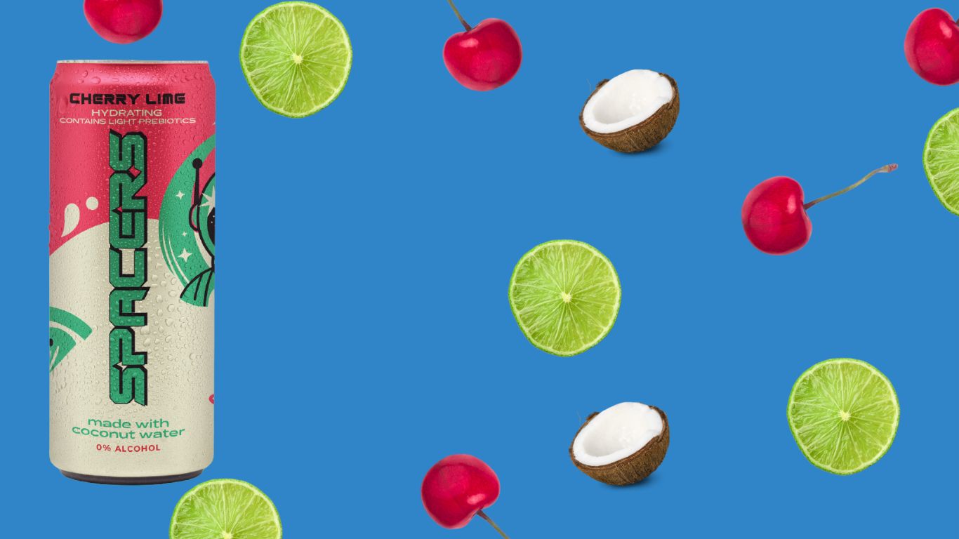 Can of SPACERS on a blue background with cherries, coconuts, and limes.